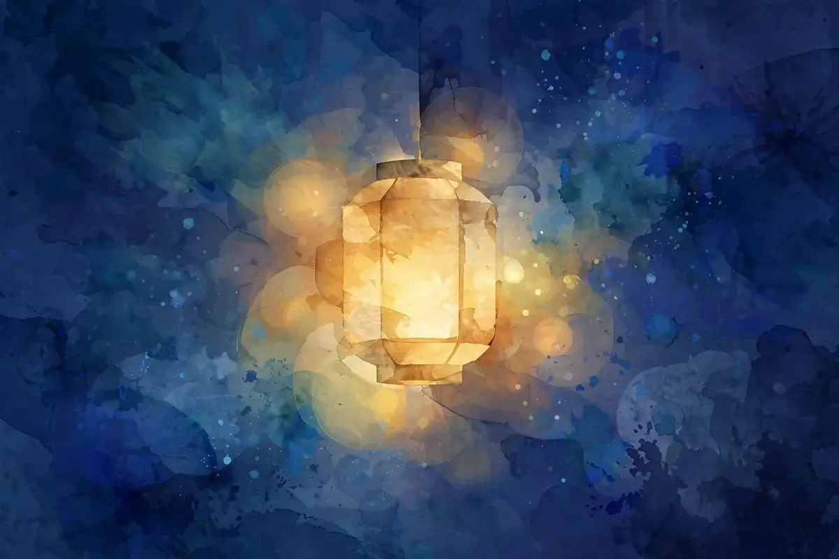 Glowing lantern against a deep blue night sky